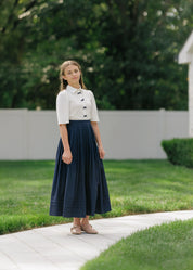 NAVY BOW BUTTON BLOUSE