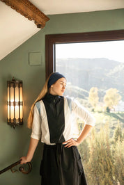 Sleeveless Zip Up Vest with Embossed Tea Logo