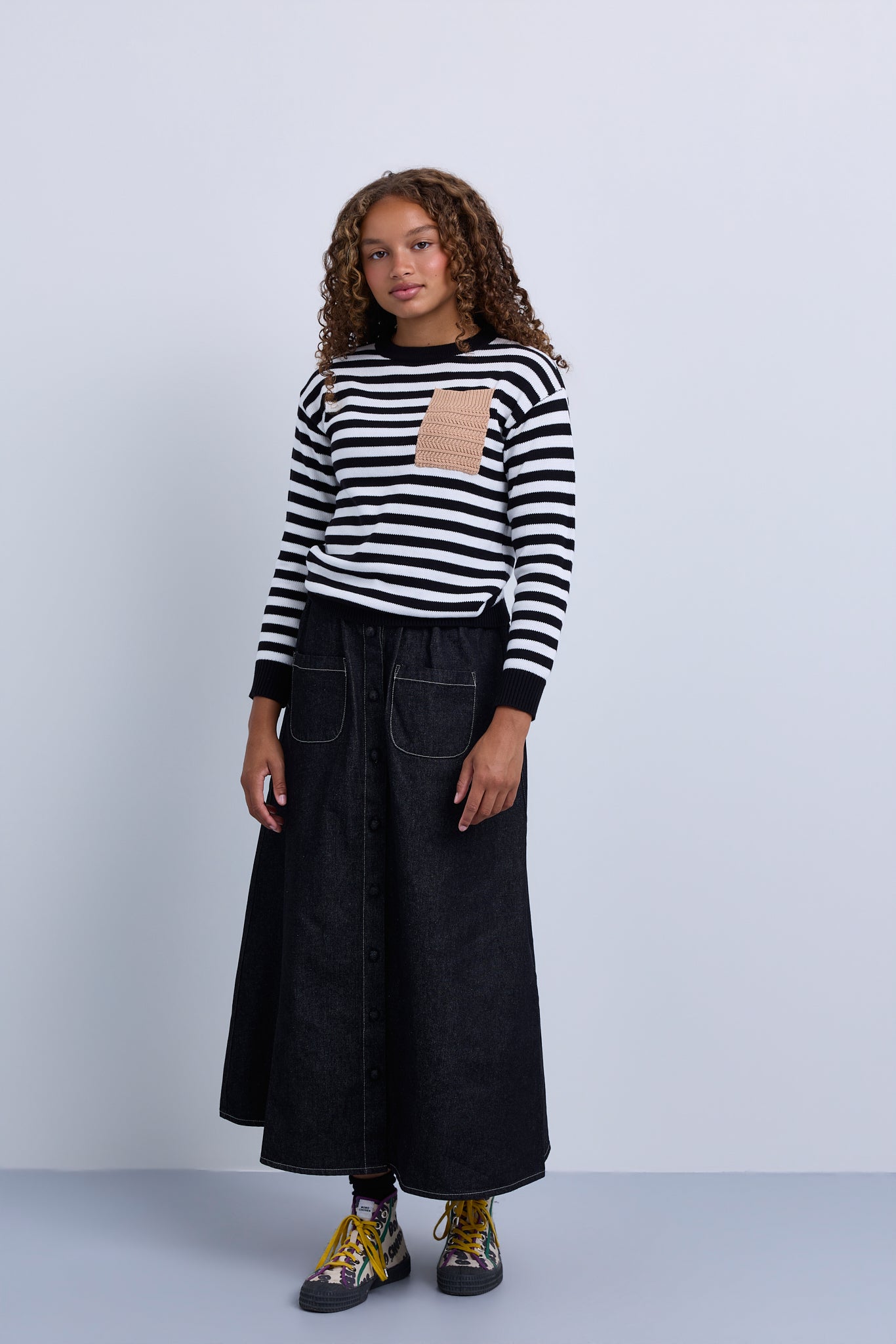 Front button panel denim skirt  with front patch pocket and subtle gathering