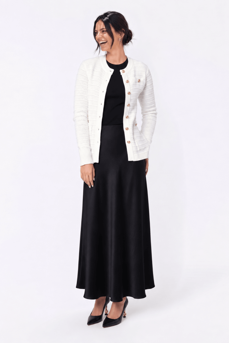 lisa-skirt-black-solid-skirt-yakira-bella-1474659_21617b05-c4de-4137-a06c-5ba881558678.png