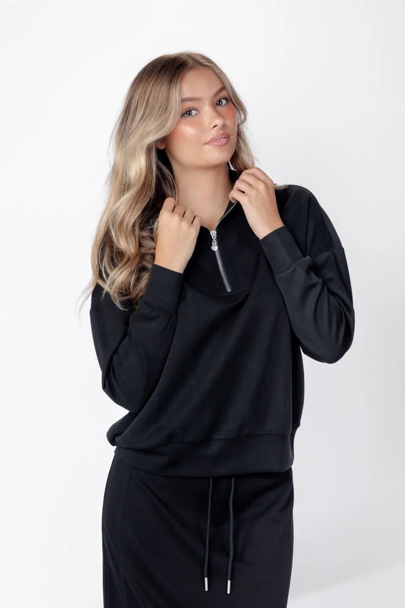 mina-half-zip-top-black-top-yakira-bella-2558099.webp